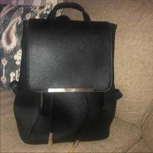 Black faux leather back- pack